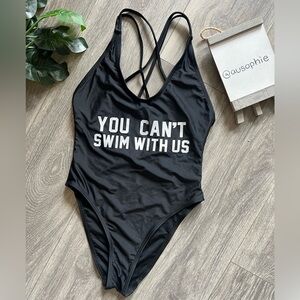 “You can’t swim with us” strappy one piece. Size M